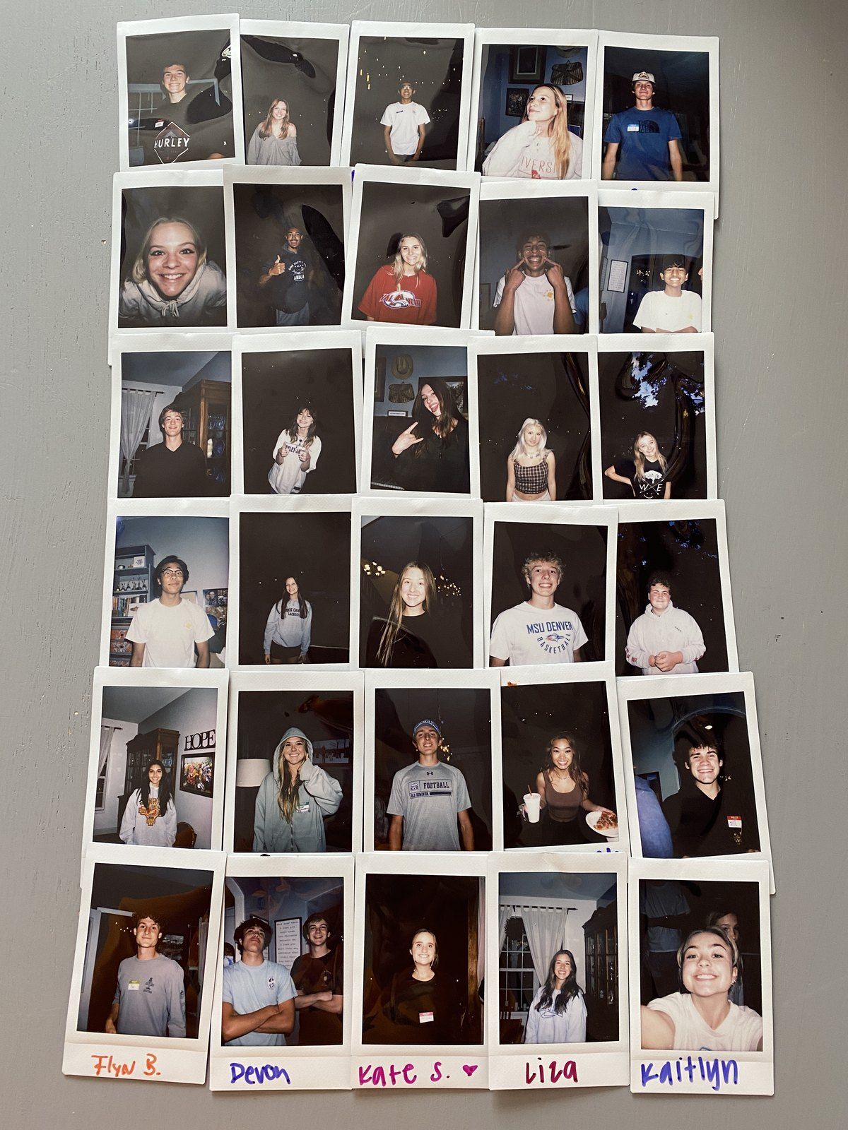 A wall of the teens’ polaroids from Monday nights at Amy’s house, 2021