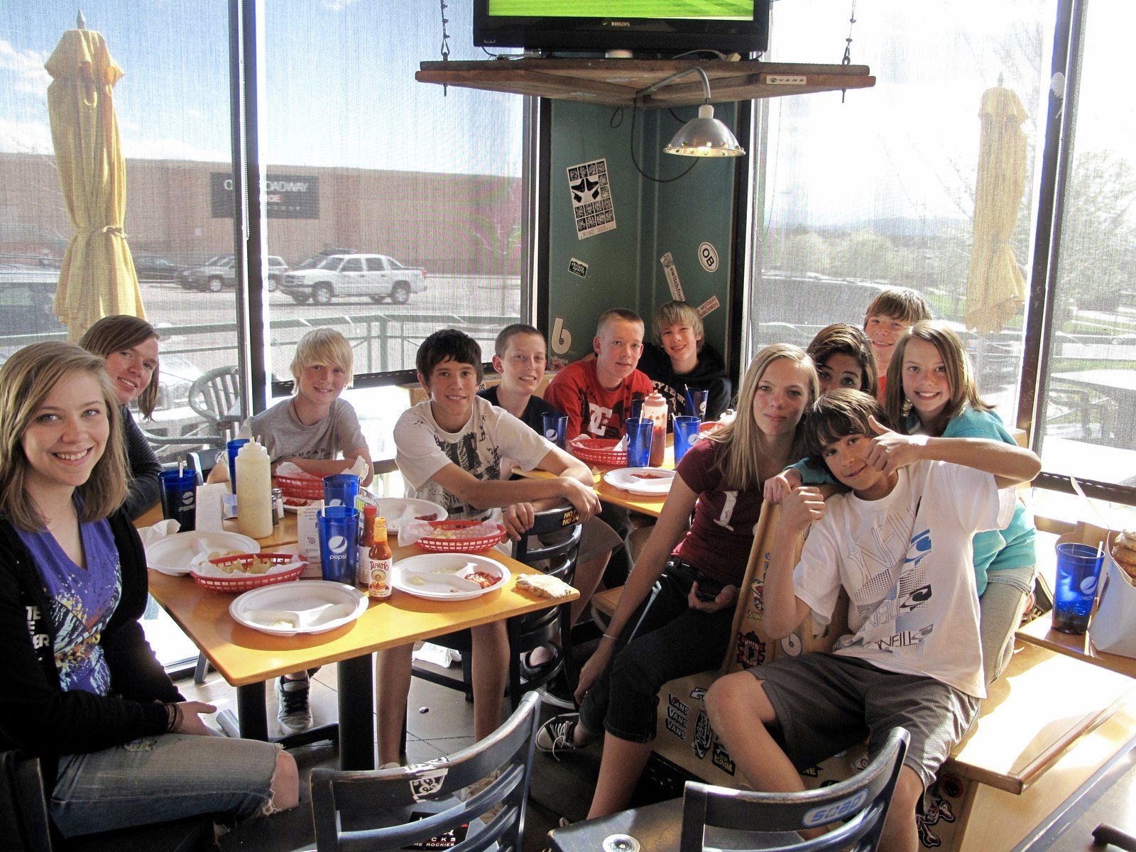Middle schoolers crowded around a table inside Wahoo’s, 2010